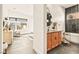 Bright main bathroom with tub, walk-in shower, double sinks, and ample counter space at 12103 Canyon Sunset St, Las Vegas, NV 89138