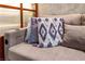 Stylish couch featuring decorative throw pillows with tassel details and convenient built-in charging ports at 125 E Harmon Ave # 216, Las Vegas, NV 89109