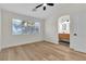 Bedroom featuring natural light, wood-look flooring, and an ensuite bathroom at 1820 Montvale Ct, Las Vegas, NV 89134