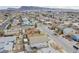 An aerial view of a well-populated neighborhood showcasing a mix of housing options and proximity to urban conveniences at 1912 Margarita Ave, Henderson, NV 89011