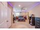 Spacious carpeted bedroom with ambient lighting and a ceiling fan at 1912 Margarita Ave, Henderson, NV 89011