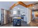 Bright kitchen features stainless appliances, gray cabinetry, and mosaic backsplash at 1912 Margarita Ave, Henderson, NV 89011