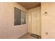 Close-up of a welcoming front entrance, highlighting the security door and modern features at 214 Roxborough St, Henderson, NV 89074