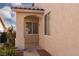 Charming covered front porch, providing a welcoming entrance to the home at 214 Roxborough St, Henderson, NV 89074