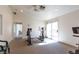 The building's gym is equipped with workout machines and mirrors and has windows for natural light at 214 Roxborough St, Henderson, NV 89074