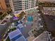 Aerial view of luxury apartment complex with pool, cabanas, and palm trees at 2700 Las Vegas Blvd # 809, Las Vegas, NV 89109