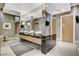 Bathroom featuring modern sinks, large mirrors, and tiled flooring at 2700 Las Vegas Blvd # 809, Las Vegas, NV 89109