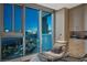 This bedroom has large windows with city views and built in cabinets at 2700 Las Vegas Blvd # 809, Las Vegas, NV 89109