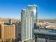 A modern Las Vegas high-rise with a sleek architectural design, and reflective glass windows against a bright, sunny sky at 2700 Las Vegas Blvd # 809, Las Vegas, NV 89109