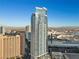 Contemporary high-rise with floor-to-ceiling windows offering stunning views of the city and mountains in the background at 2700 Las Vegas Blvd # 809, Las Vegas, NV 89109