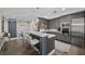 Kitchen featuring grey cabinets, white countertops, and stainless steel appliances at 2700 Las Vegas Blvd # 809, Las Vegas, NV 89109