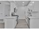 Well-lit kitchen showcasing white cabinetry, modern appliances, and sleek countertops at 3318 N Decatur Blvd # 1035, Las Vegas, NV 89130