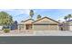 Charming single-story home features a three-car garage and desert landscaping at 3514 Jordan Ln, North Las Vegas, NV 89032