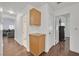 Hallway offering seamless flow with beautiful flooring, natural lighting, and convenient cabinet storage at 3514 Jordan Ln, North Las Vegas, NV 89032