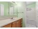 Bright bathroom with a single vanity and shower/tub combination at 3696 Monte Verde St, Las Vegas, NV 89121