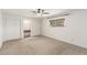 Empty bedroom featuring ample closet space, a vanity, and bright window at 3696 Monte Verde St, Las Vegas, NV 89121