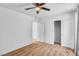 Bedroom with neutral carpet, ceiling fan, and closet provides a serene and comfortable space at 3757 Via Gennaro, Henderson, NV 89044