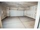 Clean two-car garage featuring concrete flooring and ample space, ideal for parking and storage solutions at 3757 Via Gennaro, Henderson, NV 89044