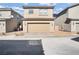 Two-car garage exterior with tile roof and desert landscaping at 3757 Via Gennaro, Henderson, NV 89044