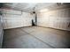 Spacious two car garage with concrete floors, perfect for storage or parking at 3757 Via Gennaro, Henderson, NV 89044