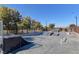 Well-maintained community skate park with ramps and rails, perfect for skateboarding and rollerblading enthusiasts at 3757 Via Gennaro, Henderson, NV 89044