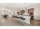 Bright eat-in kitchen featuring stainless steel appliances and a large center island with seating at 4081 Turquoise Falls St, Las Vegas, NV 89129