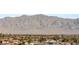 Scenic landscape view with houses in the distance at 4081 Turquoise Falls St, Las Vegas, NV 89129