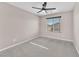 Bedroom with a ceiling fan and large window at 4116 Free Bird Crest Ave, North Las Vegas, NV 89081