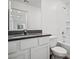 Clean bathroom featuring a sleek vanity, modern fixtures, and a combined shower-tub at 4211 Gold Desert St, North Las Vegas, NV 89032