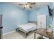 Cozy bedroom furnished with bed, wardrobe, and small dining set at 4260 E Cincinnati Ave, Las Vegas, NV 89104