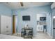 Bedroom featuring tiled floors, and a mini kitchen area at 4260 E Cincinnati Ave, Las Vegas, NV 89104