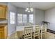 Bright dining area with table and chairs, and natural lighting streaming through windows at 4260 E Cincinnati Ave, Las Vegas, NV 89104