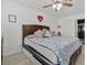 Bedroom boasting natural light, a ceiling fan, and a calming ambiance at 4303 E Viking Rd, Las Vegas, NV 89121