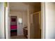 Bathroom featuring a glass-enclosed shower and wood vanity, conveniently connected to the bedroom at 4384 Grey Spencer Dr, Las Vegas, NV 89141