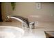 Elegant bathroom sink featuring a modern faucet and sleek countertop, ideal for a luxurious home at 4384 Grey Spencer Dr, Las Vegas, NV 89141