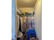 Walk-in closet with clothes, shelving, and personal items at 4384 Grey Spencer Dr, Las Vegas, NV 89141