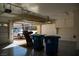 Spacious garage featuring storage, exercise equipment, and an epoxy floor at 4384 Grey Spencer Dr, Las Vegas, NV 89141