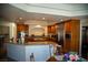 Spacious eat-in kitchen features stone countertops and modern stainless steel appliances at 4384 Grey Spencer Dr, Las Vegas, NV 89141