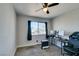 Bedroom featuring a ceiling fan, carpet floors, and natural light from the window at 4505 Providence Ln, Las Vegas, NV 89107