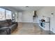 Inviting living room featuring wood floors, stairs, and white trim at 4505 Providence Ln, Las Vegas, NV 89107