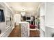 Spacious walk-in closet with custom shelving, chandelier, and a central island at 4542 Grey Spencer Dr, Las Vegas, NV 89141