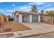 Charming home featuring a large driveway and a quaint carport at 4769 Via Renaldo, Las Vegas, NV 89103