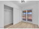 Bedroom with closet doors and sliding glass door that leads to the backyard at 4825 Randall Dr, Las Vegas, NV 89122