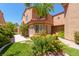 Beautiful exterior view showcasing manicured landscaping and a covered patio at 5101 Breakers Ln, Las Vegas, NV 89113