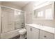 Bright bathroom with tub-shower combination and a modern vanity at 5326 Swenson St # 61, Las Vegas, NV 89119