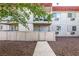 Charming apartment building with patios on each level and pathway at 5326 Swenson St # 61, Las Vegas, NV 89119