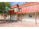 Charming apartment complex featuring stairwell and patios with red accents at 5326 Swenson St # 61, Las Vegas, NV 89119