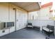 Outdoor patio seating area with secure gate for added privacy and security at 5326 Swenson St # 61, Las Vegas, NV 89119