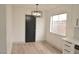 Dining area with modern chandelier and window at 5825 Bent Branch Ln, Las Vegas, NV 89142