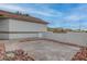 Back patio with concrete and gravel landscaping at 613 W Victory Rd, Henderson, NV 89015